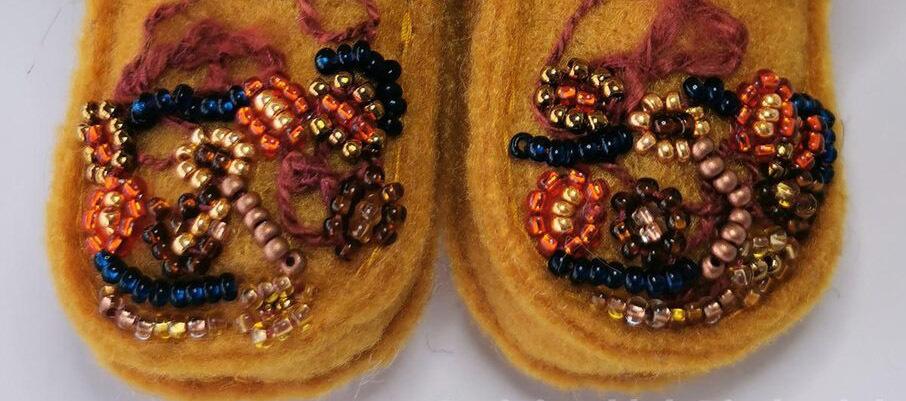 Felted boots with beaded dry flowers 