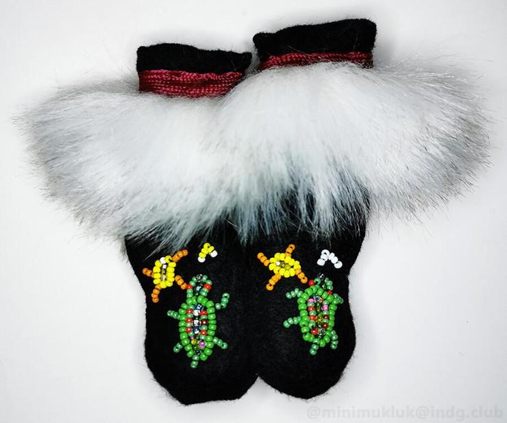 Black felt with white tuffed fur. Very fuzzy these ones. Chose burgandy shoelaces for these. Each pair has a two turtles facing the direction of the sun and mountain.